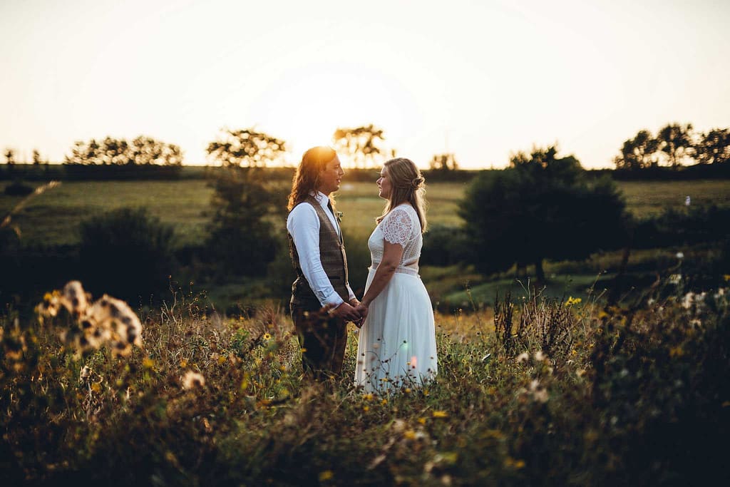 Bride and groom at dusk at a festival wedding in devon